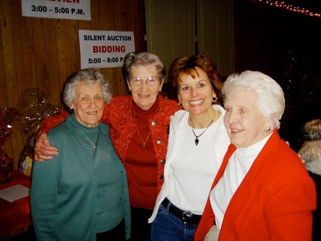 Photo provided by Kathy Wulf Lindquist. The three ladies I’m with are pillars of the Blue Grass community.  Left to right- Marion Myers (owned grocery store in town & worked at bank) Lillian Schnoor (School Secretary) me, Ruth Erickson, teacher